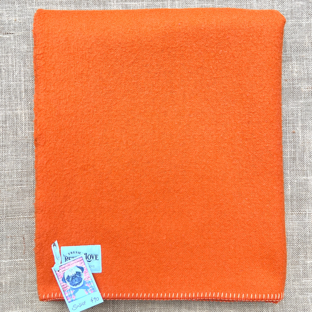 Vibrant orange solid colour SINGLE New Zealand wool blanket