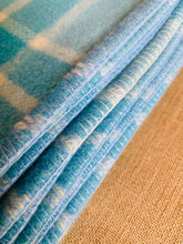 Load image into Gallery viewer, Happy Turquoise, soft and cosy SINGLE Pure Wool Blanket. Wanganui Woollen Mills
